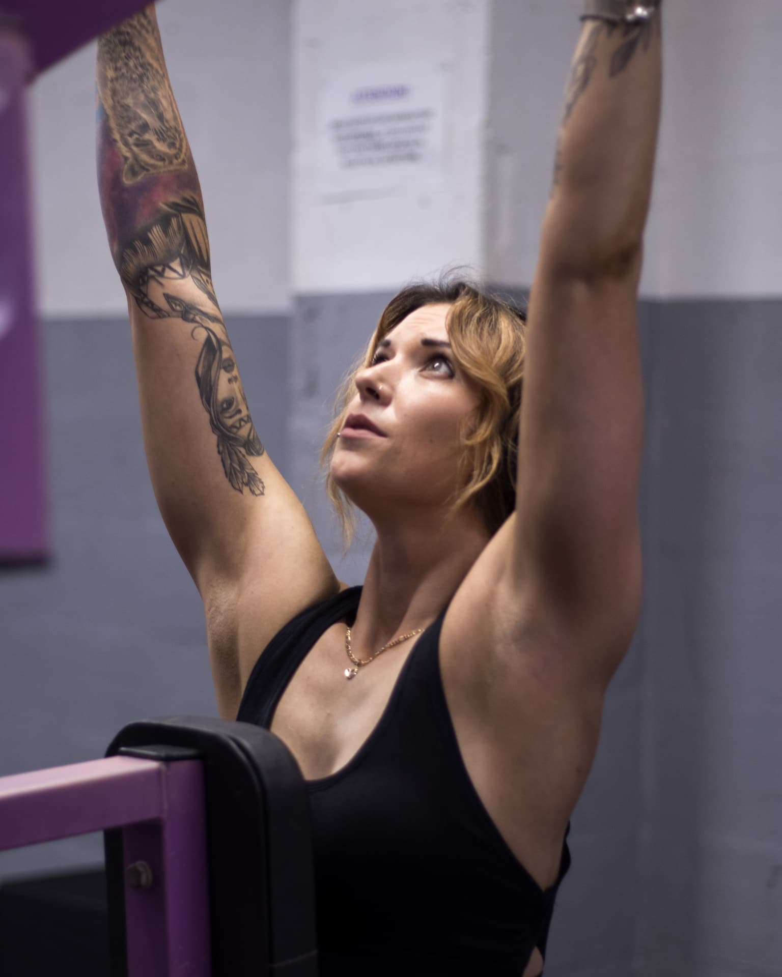 Coach mid-rep on a machine during an HRC Coaching shoot